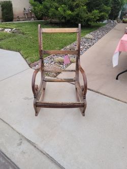 Antique , Un-upholstered Rocking Chair