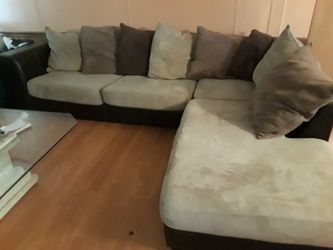 Sectional for sale with ottoman $200 obo need gone asap.