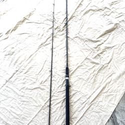 Like new hardly used 8-1/2ft Daiwa graphite, two piece, medium action, fishing rod