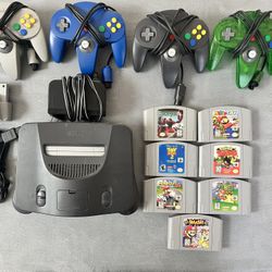 Nintendo 64 With Games, Controllers And Rumble Pack