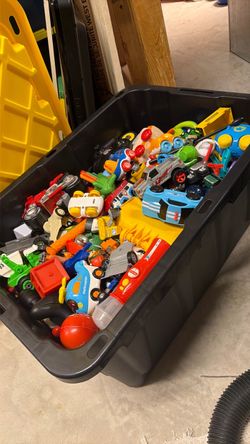 Bin of kids toys, cars, trucks, helicopters, probably best for 1-4 years old