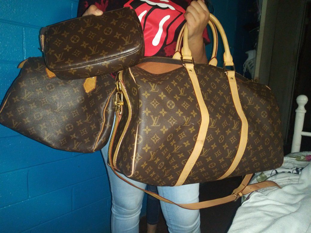 Louis Vuitton Purse and makeup bag. Duffle bag