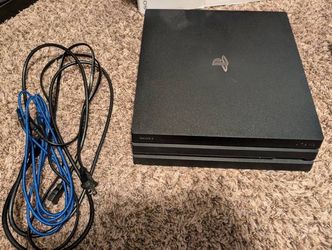 PS4 Pro with 500gb SSD upgrade and 11 action/rpg games