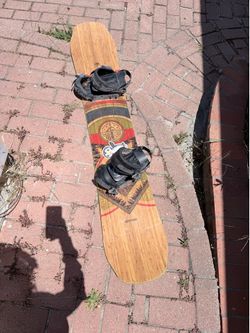 160cm Arbor Coda snowboard with bindings