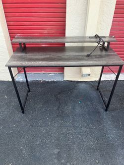 GRAY DESK with powered outlets