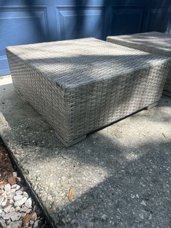 (2) wicker patio ottomans