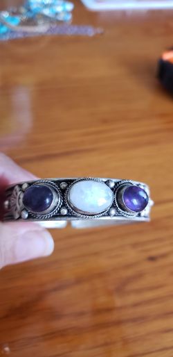 Silver bangle with 3 gemstones