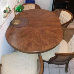 Table And 4 Chairs 40.00. Delivery It For 20.00