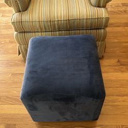 Two matching chairs and ottomans
