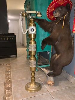 Vintage brass floor standing rotary telephone: James Mont  style Hollywood regency