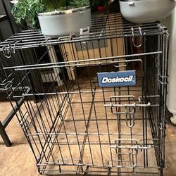 Dog cage and doggy bowls