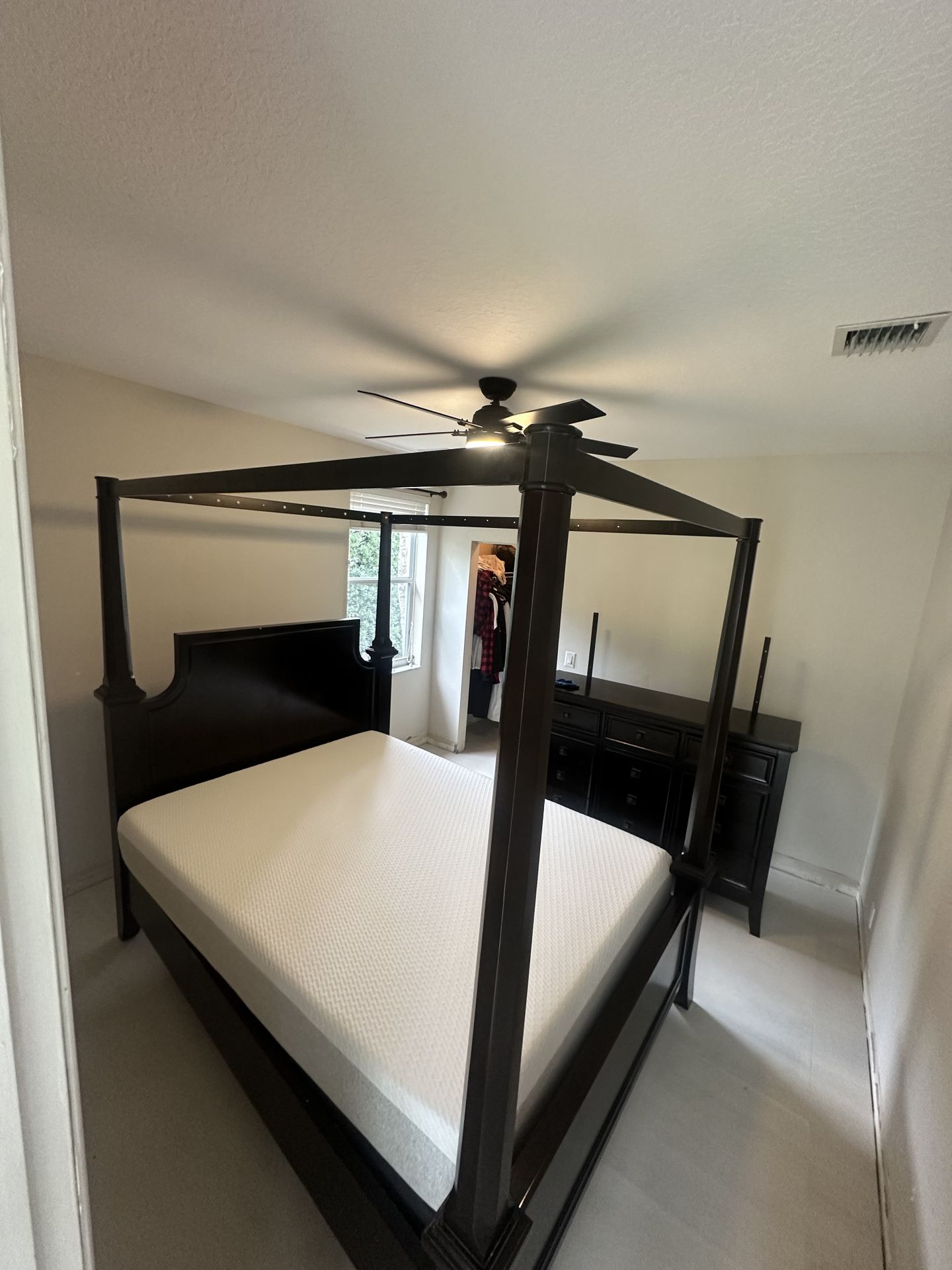 Rarely used Queen bedroom bed canopy dark wood good quality solid wood