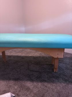 Massage table