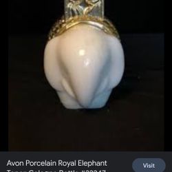 Avon Porcelain Royal Elephant Topaz Cologne Bottle 