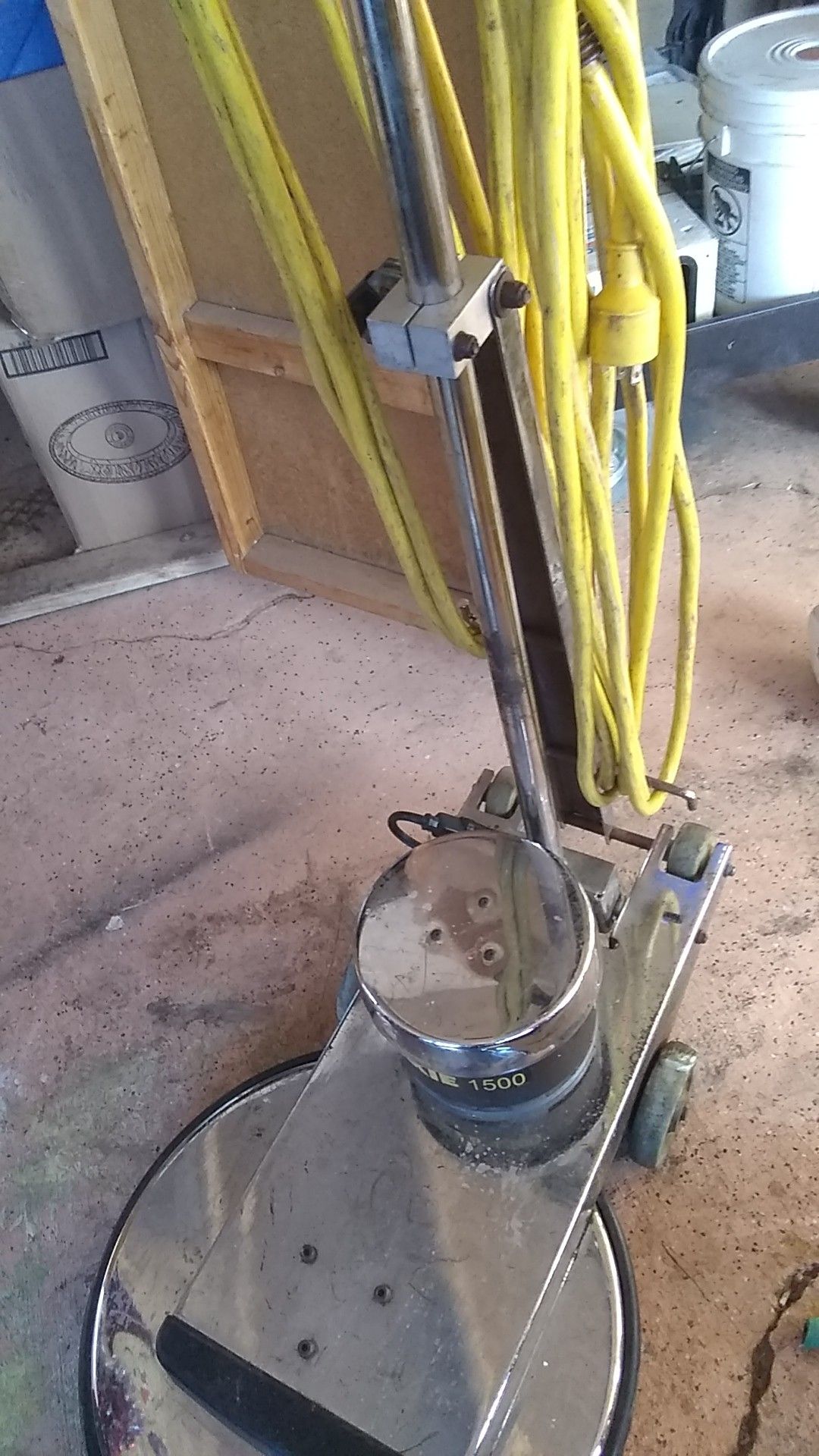A waxy 1500 floor scrubber in good condition floor buffer with a 5 gallon bucket of wax asking $450 or best offer