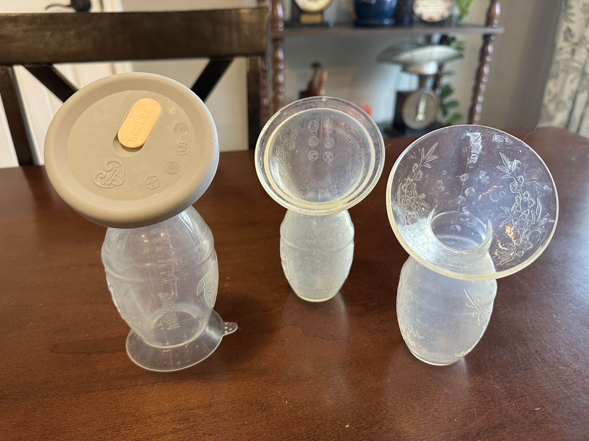 3 Haaka Silicone Breast Pumps• 1 Lid