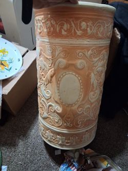 Cylindrical ceramic umbrella or cane stand (also commonly used as a floor vase or plant stand)