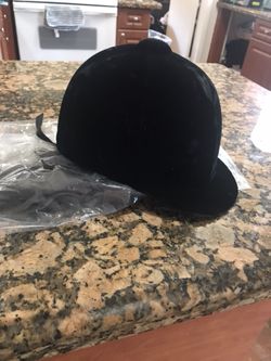 Horse back riding helmet and gloves