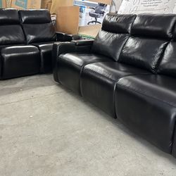 New Renaissance leather power reclining sofa with drop down table   Retails for $1,699.99 EACH I’m selling the pair for $1,100  PLEASE READ!!! When th