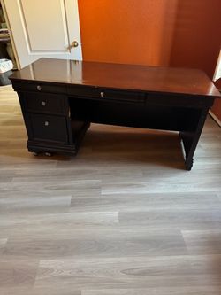 L-shaped executive desk with hitch
