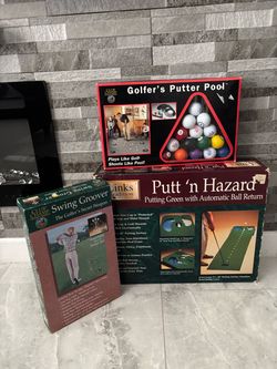 Putting green with automatic ball returner, swing groover and golfer’s putter pool.