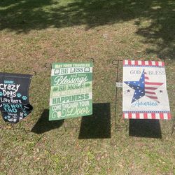 Home and garden flags with stand new $20  each in n Lakeland 
