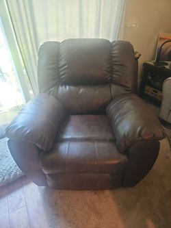 Leather rocking recliner