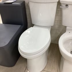 Kohler Irvine Two Piece Toilet, Fully Skirted, Seat Included, Available For Pick Up