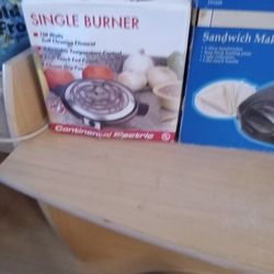 Small electrical appliances and for beautiful orange coffee cups.