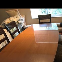 Danish Designer Long Dining Table With Glass Protective Cover Asking $775. , Price Reduced For A Quick Sale 