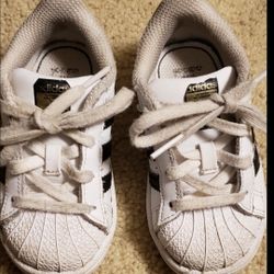 White and Black Adidas size 6c kids
