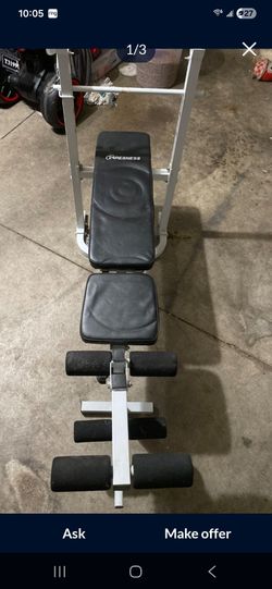 FREE..weight bench ..used a handful of times..kept clean in the garage