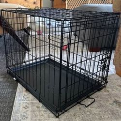 Small black dog or puppy crate & pillow/pad