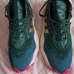 Trae Young 3 men's basketball shoes in the Team Dark Green / White / Gold colorway. 