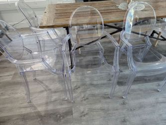 5 of Clear Acrylic Ghost style armchairs