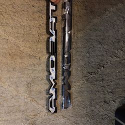 Toyota Tacoma  Overlay blackout emblems, fits model year 2016 through 2023.