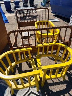 Yellow chairs. Without seats wood.  Solid.