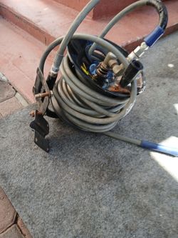 RRIEL PARA MANGUERA DE LAVAR CARROS EN MUYBUENAS CONDICIONES
