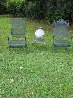 Wrought iron patio set with wrought iron table