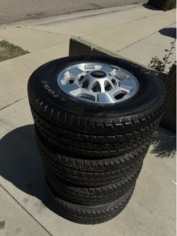 Firestone Transforce AT LT265/70R17 Tires with Chevrolet Wheels (8 lug)