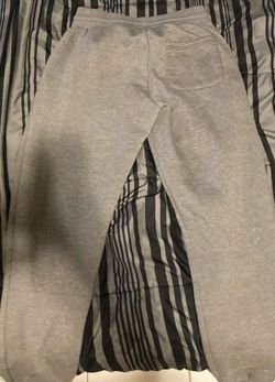 Grey Nike tech sweats size medium grade school/teen 40$