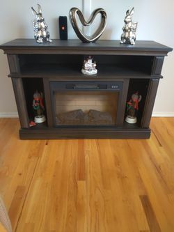 electric fireplace with heating and remote control.