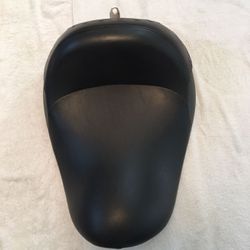 Harley Davidson solo seat with raised backsupport with studs.