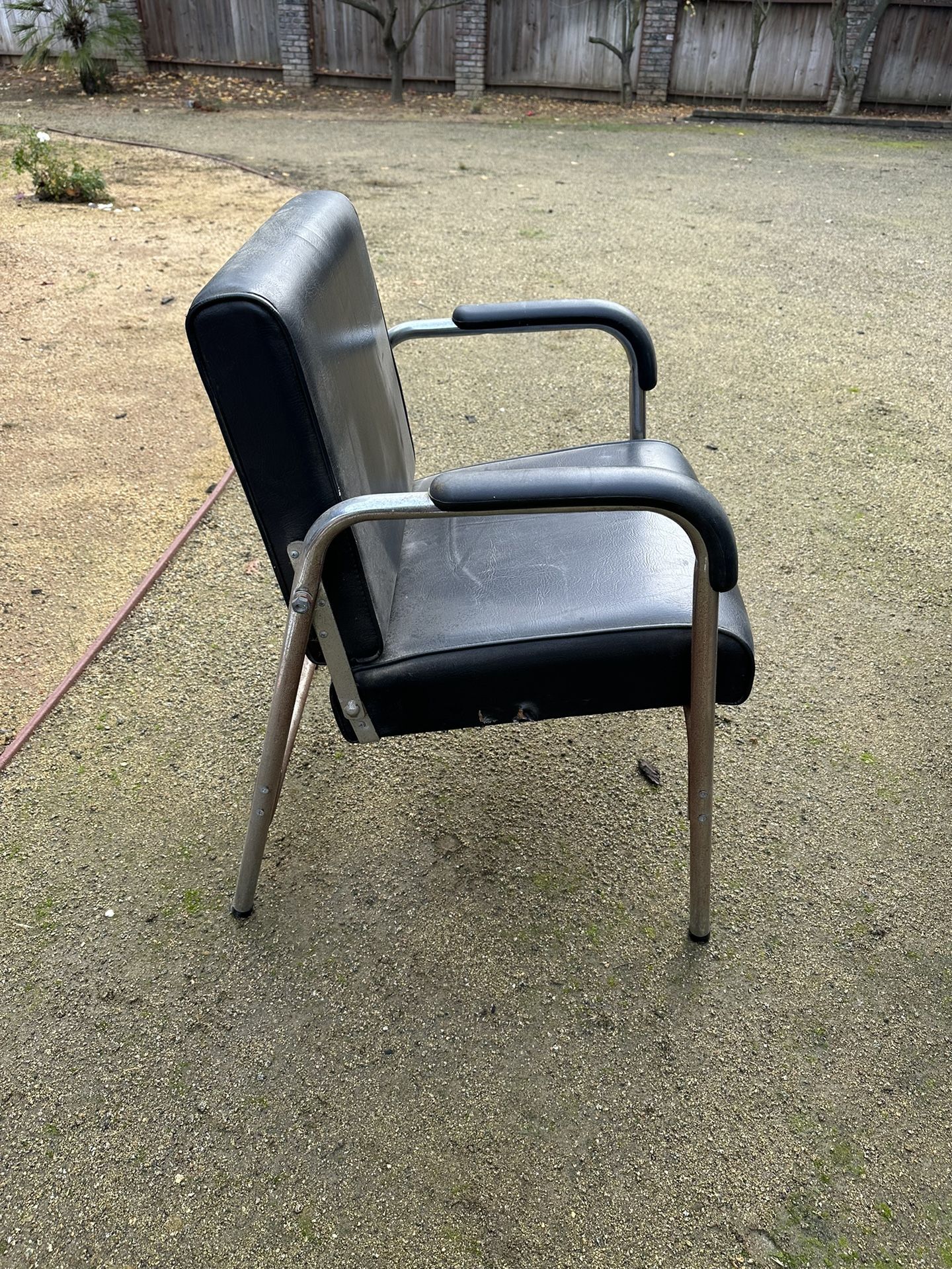 Reclining metal chair