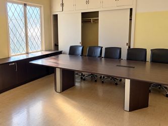 Conference table, 8 chairs, and credenza