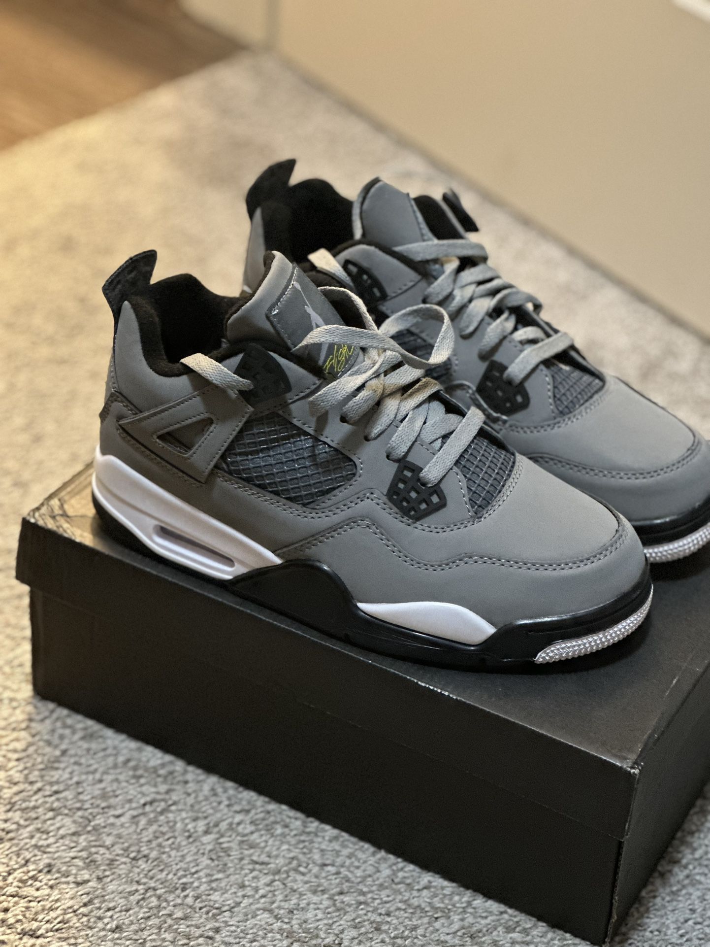 Grey Jordan 4’s (size 8)