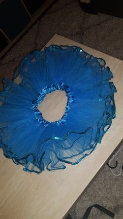 Skirts Blue is size M and Purple is size L for kids