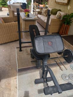 $70.00 Marcy Club weight bench and weights