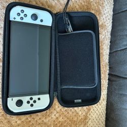 NINTENDO SWITCH OLED WITH TWO GAME