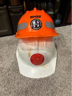 Pair of vintage railway helmets